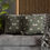 Thumbnail: Olive green pillowcase featuring a soft scattered pattern of illustrated moths and butterflies in neutral earth tones, painte