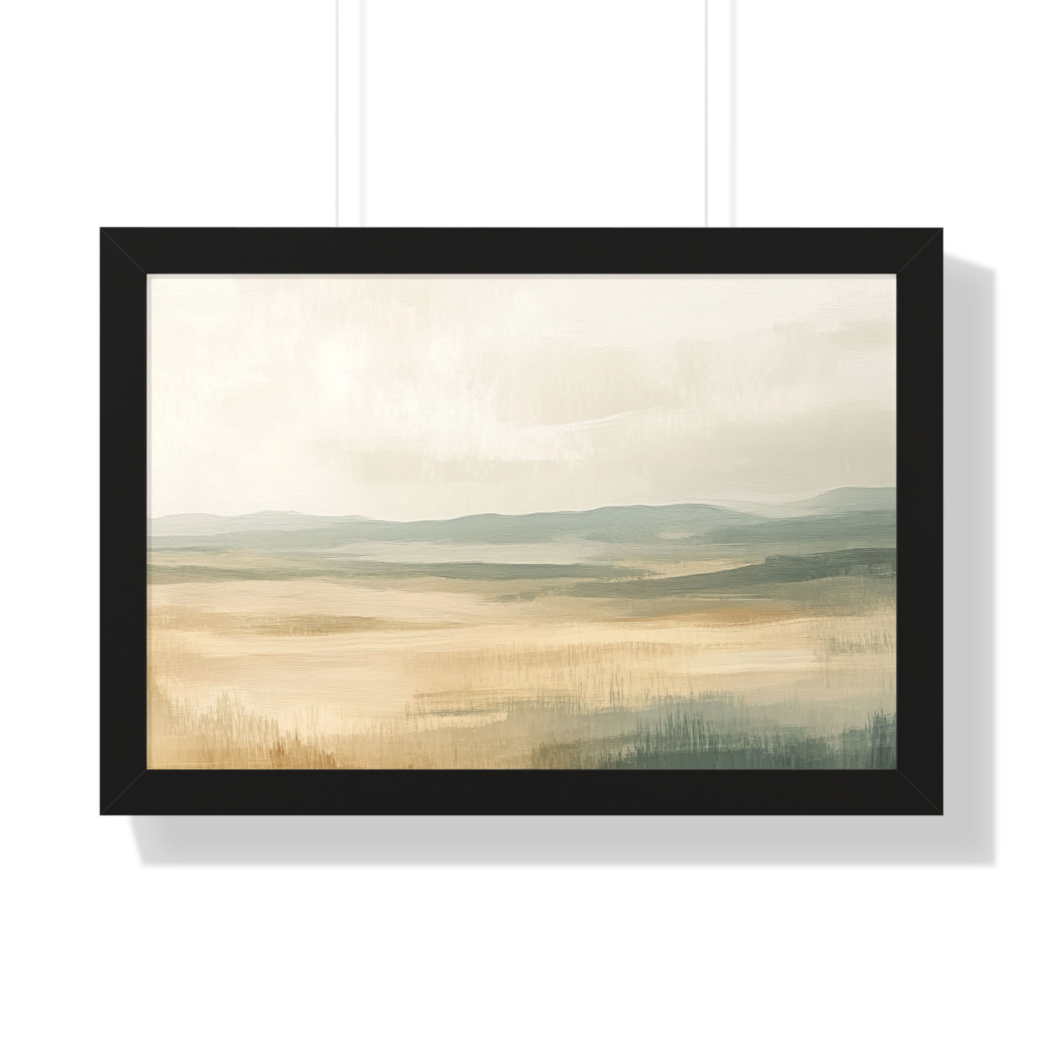 Framed wall art featuring a minimalist soft landscape of golden fields and hazy blue-gray hills in earthy tones