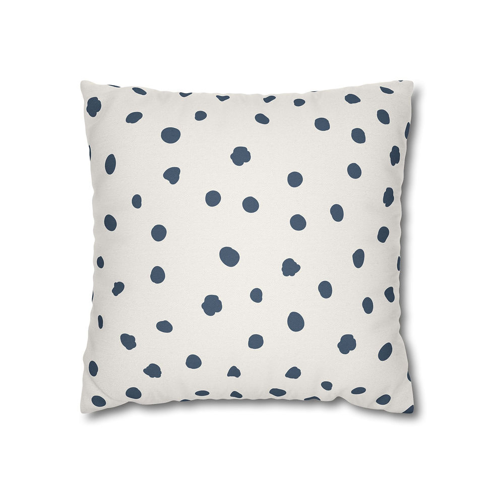 Pillow cover with an off-white background and irregular navy blue polka dots scattered across the surface for a playful, mode
