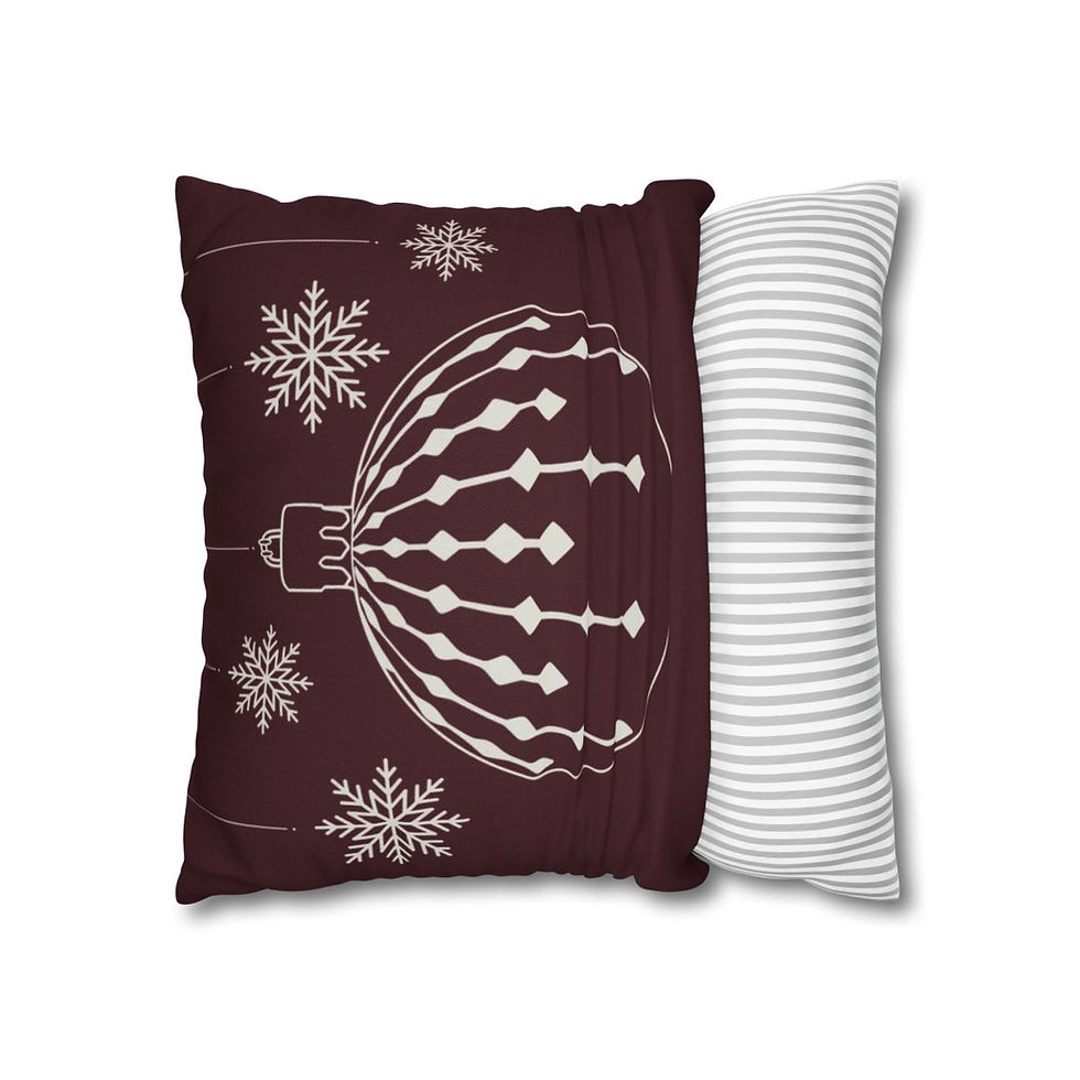 Pillow cover with a vintage-style white ornament and snowflakes on a burgundy background, ideal for holiday decorating.