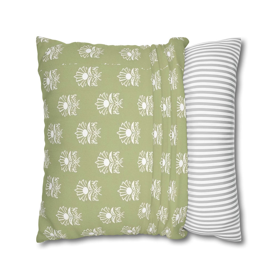 Square sage green floral pattern cushion with white block-style botanical print on a white background.