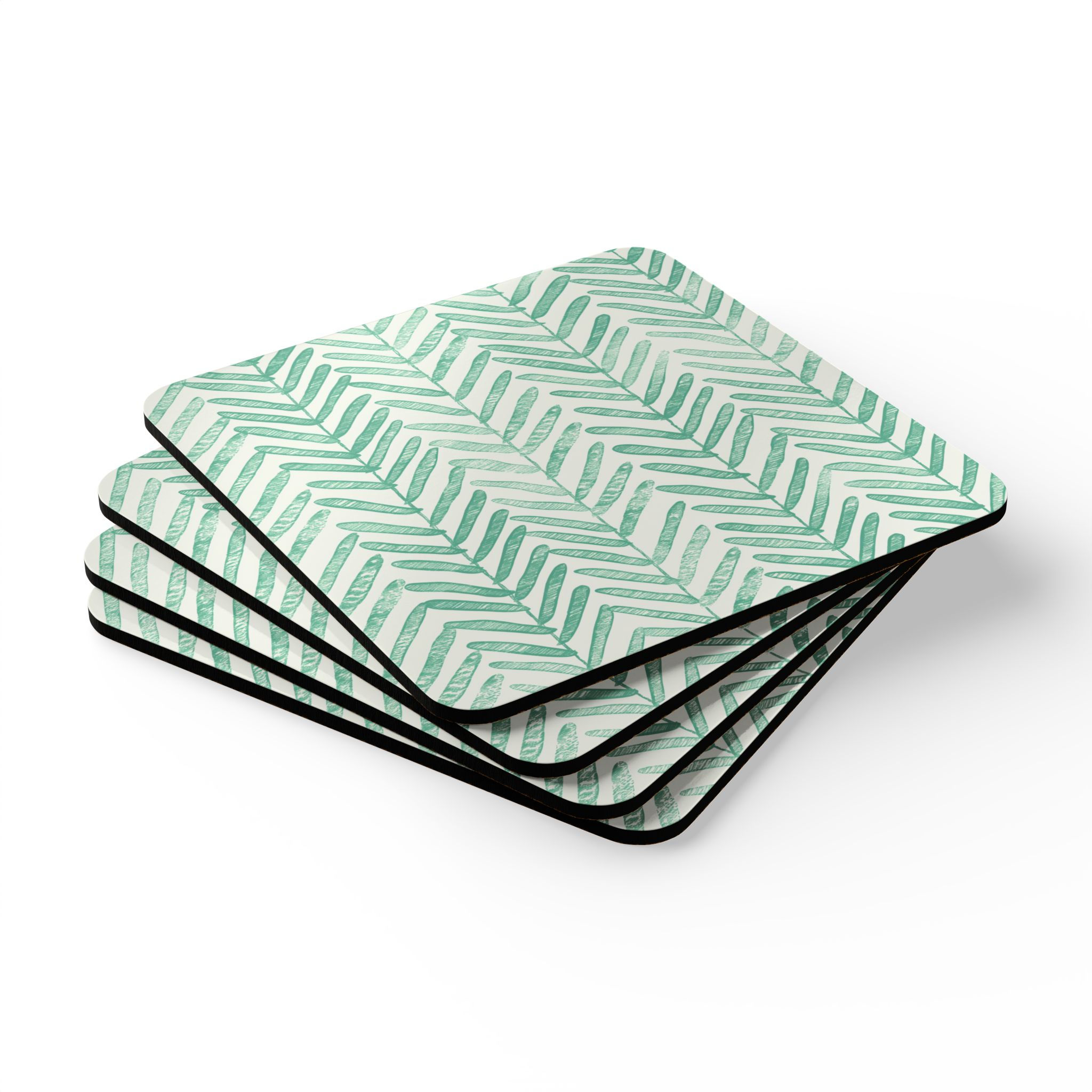 Set of four coasters featuring a green watercolor herringbone pattern on a neutral background, adding a fresh modern touch