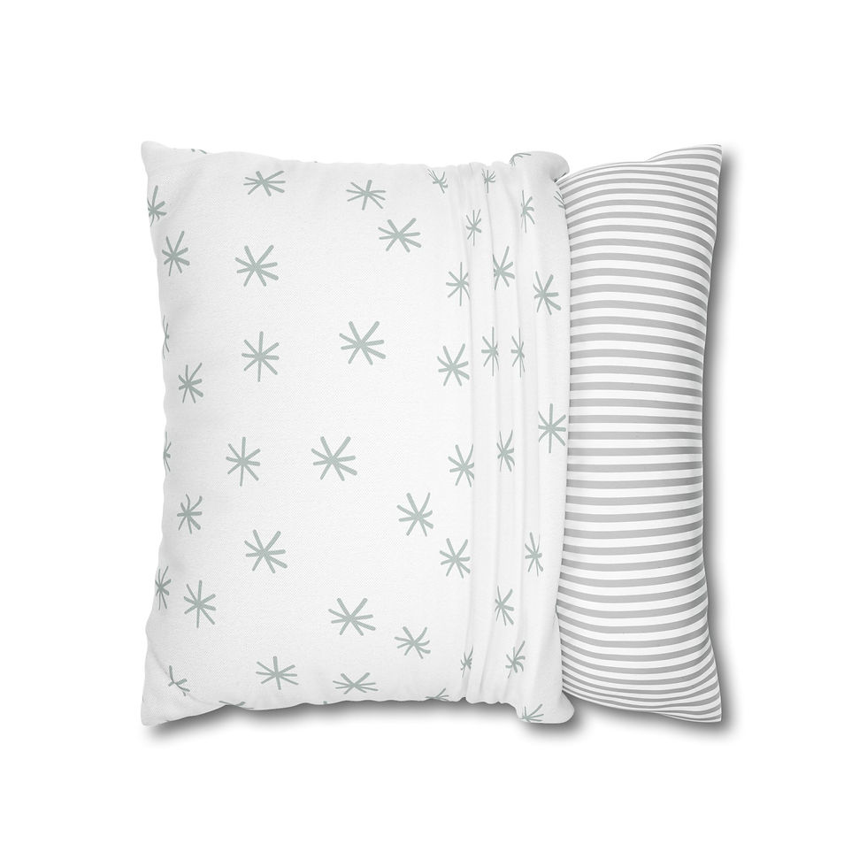 Square throw pillow with sage green starburst patterns on a white background, ideal for minimalist and modern decor.