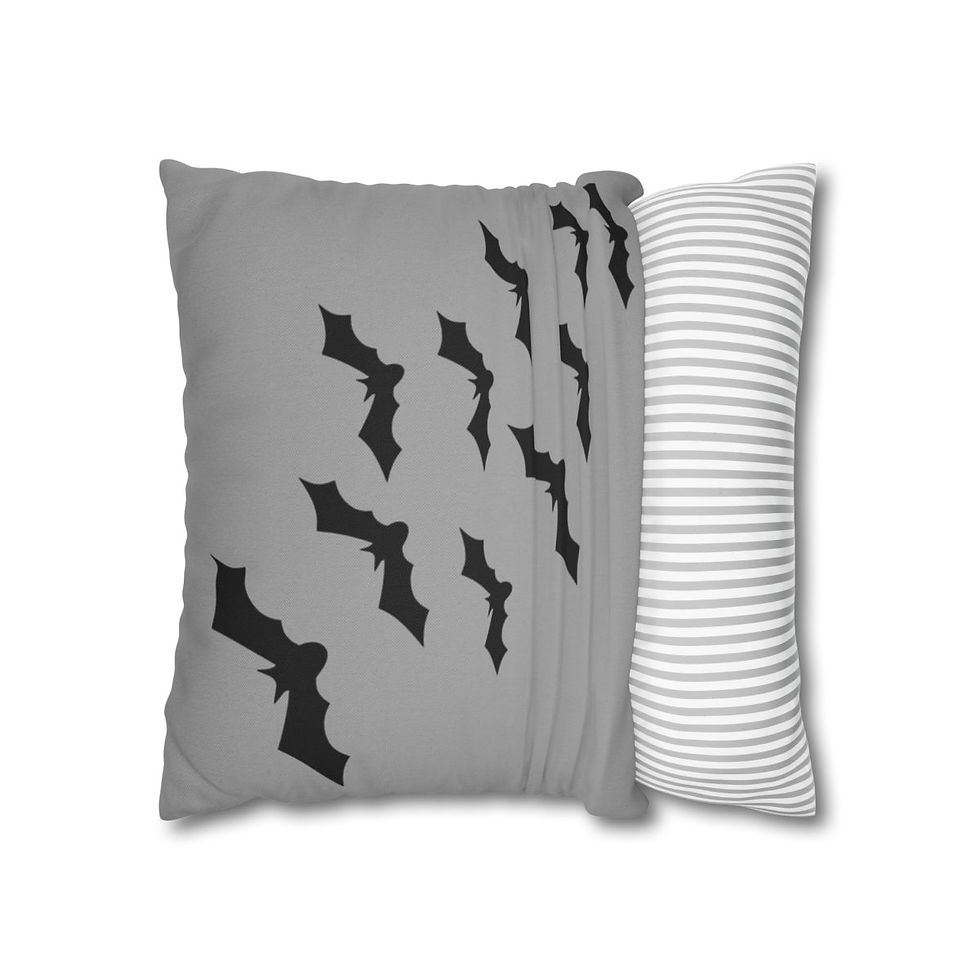 Pillow cover with black bat silhouettes flying on a grey background.