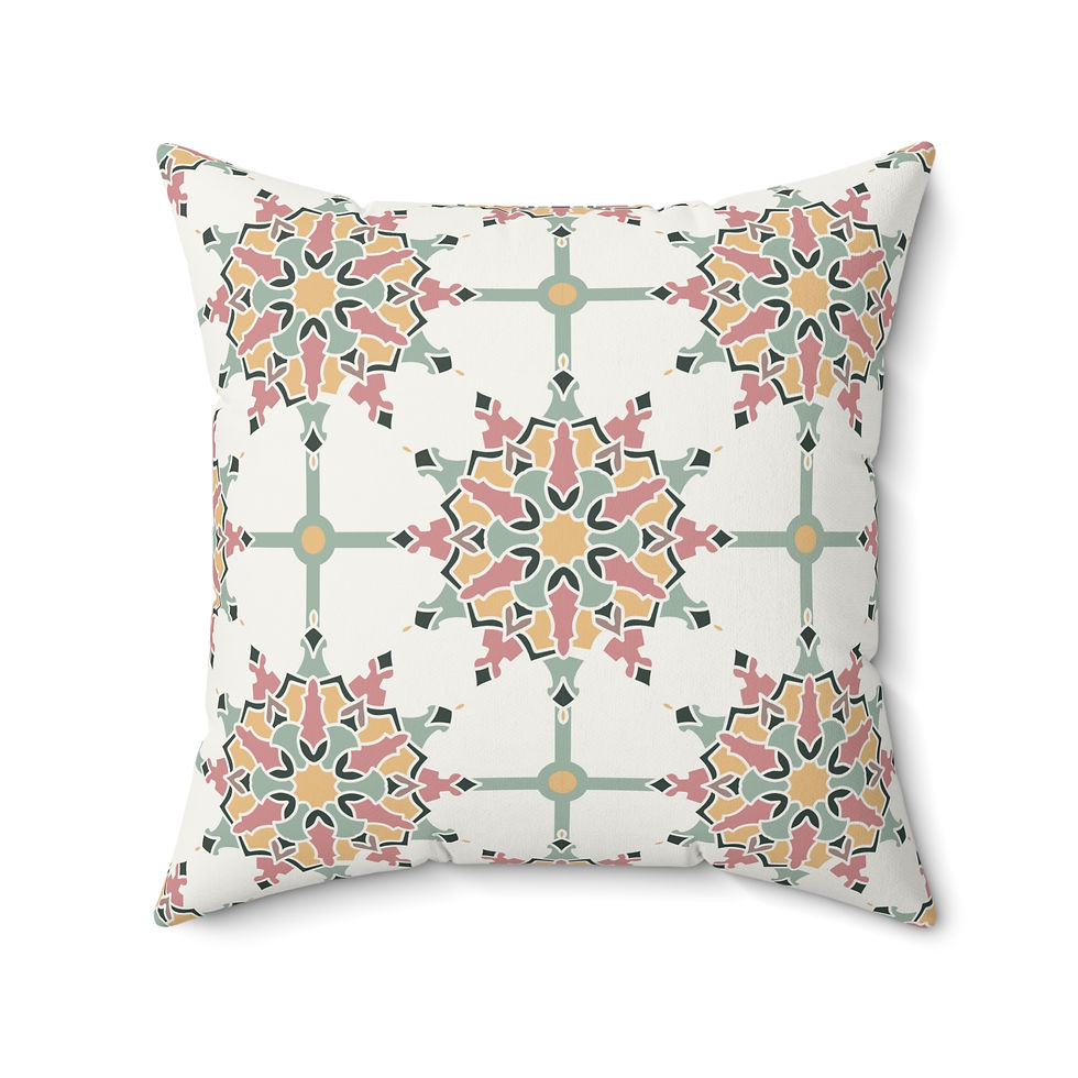 Faux suede pillow with Moroccan tile-inspired pattern in pink, green, and yellow on a white background.