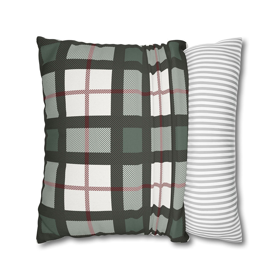 Holiday pillow cover with traditional green, black, cream, and red plaid pattern in tartan style