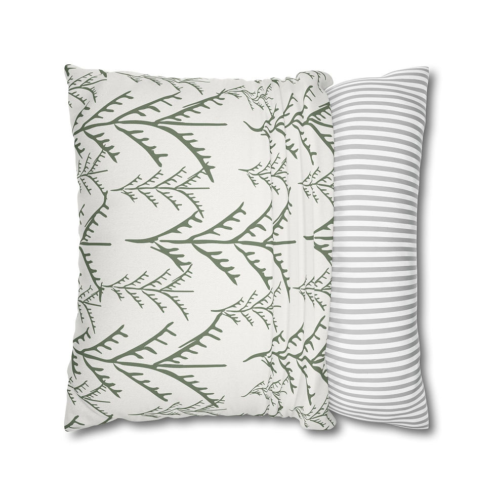 White pillow cover with hand-drawn green pine tree outlines in a repeating minimalist forest pattern