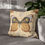 Thumbnail: Cream-colored pillowcase with large symmetrical butterfly design in mustard, brown, and black, surrounded by soft blue flower
