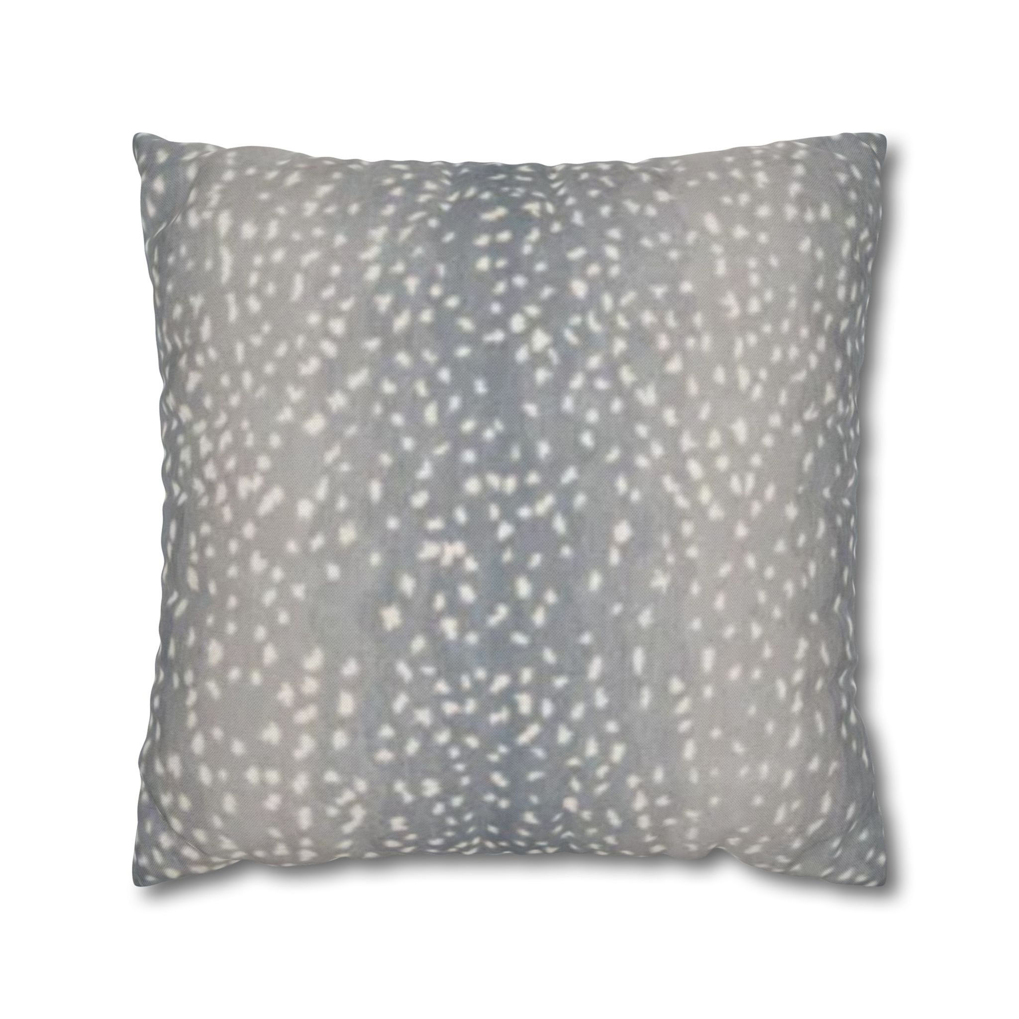 Square slate blue cushion with a white speckled fawn-style animal print pattern on a plain background.