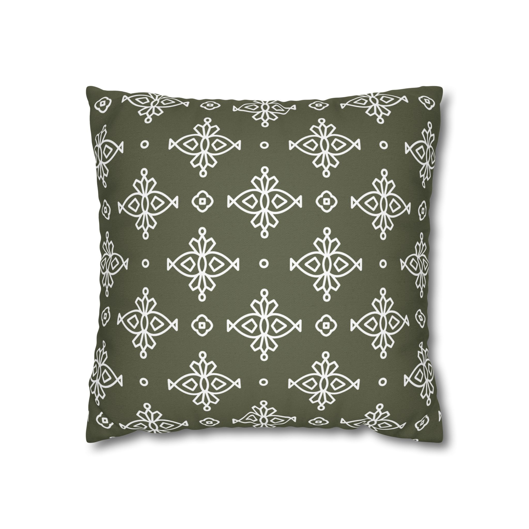 Square throw pillow with intricate white geometric patterns on a green background, ideal for modern and rustic home decor.