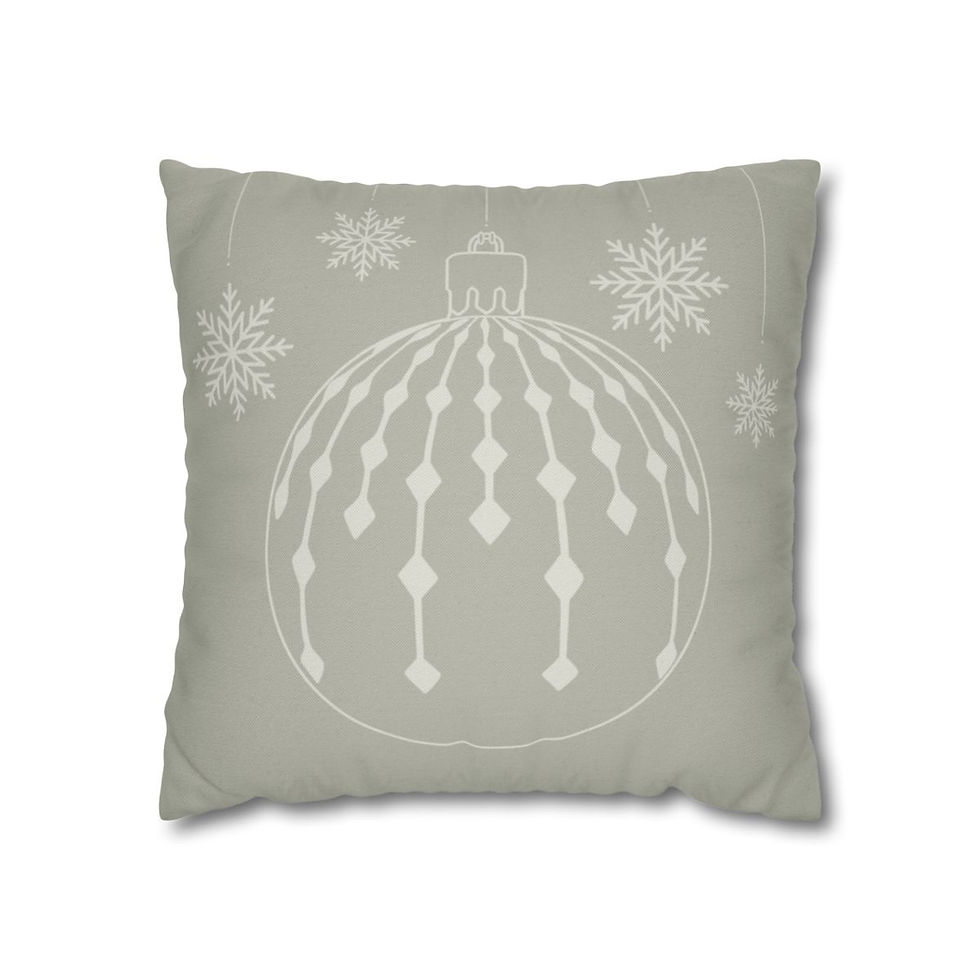 Decorative pillow cover with a minimalist design of a Christmas ornament and snowflakes on a soft neutral background.