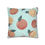 Thumbnail: Cushion cover with coral oranges, citrus slices, green leaves, and white flowers on a light aqua background.