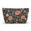 Thumbnail: Floral accessory pouch with blush pink flowers and green leaves on a black background – zippered botanical makeup bag.
