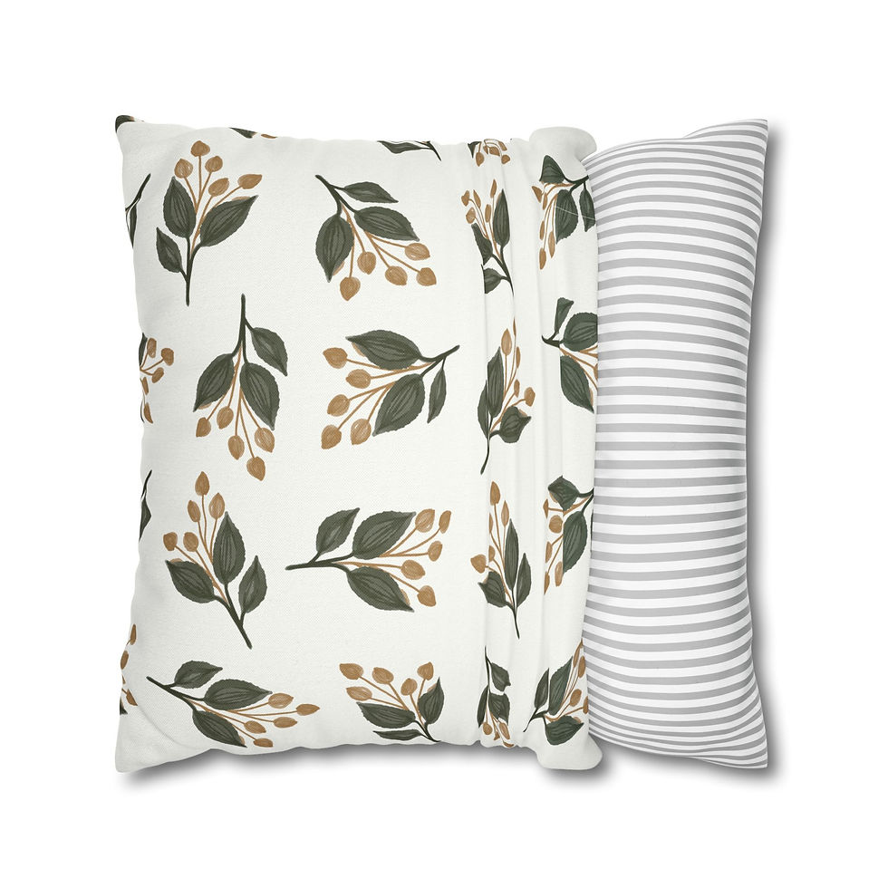 Minimalist cushion cover with olive and taupe botanical sprigs on white fabric background.