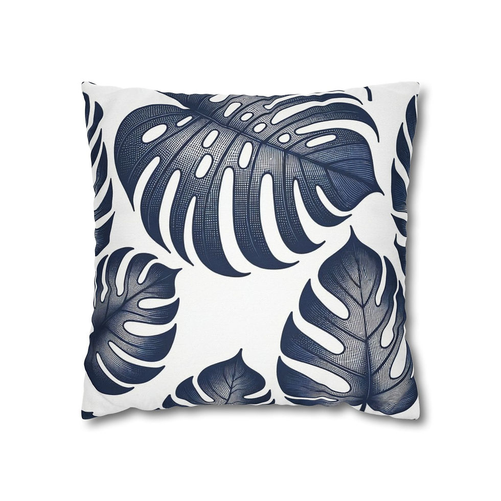 White pillow cover with navy Monstera leaf pattern.