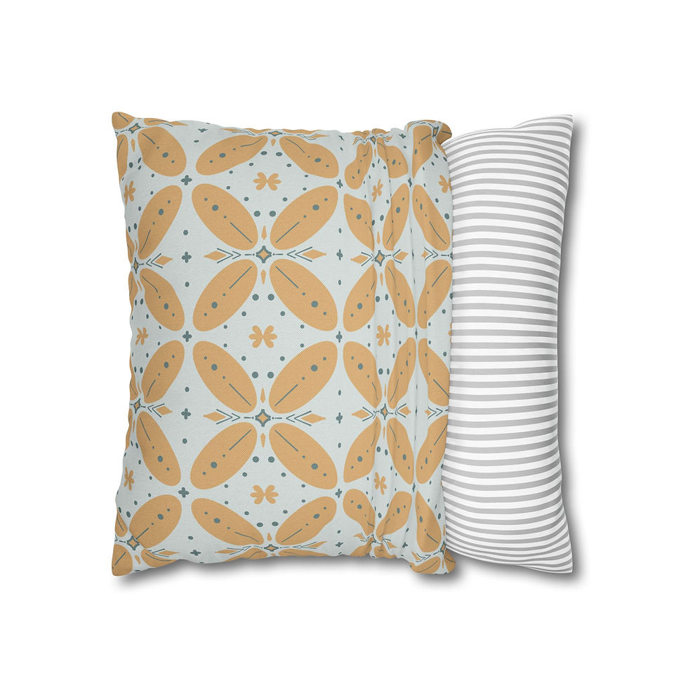Cushion cover with golden oval petal shapes and teal floral details on a cream background in a repeating geometric pattern.e