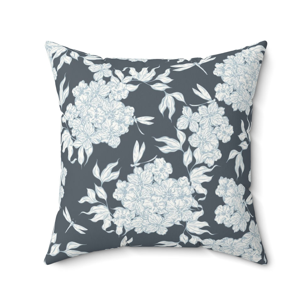 Square decorative suede cushion featuring a dark charcoal grey background with a beautiful repeating pattern of light blue hy