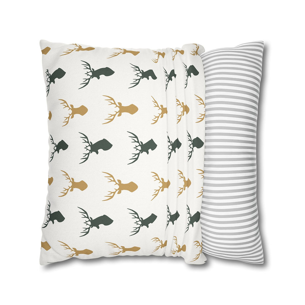 Repeating deer head pattern in forest green and gold on a white pillow cover, perfect for rustic holiday décor