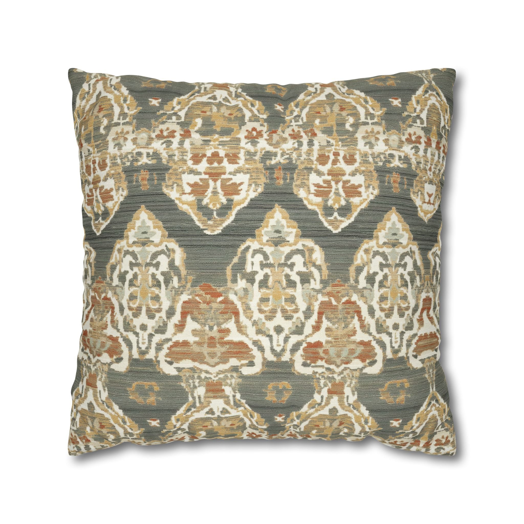 Decorative cushion with vintage Ikat pattern in earthy tones of olive, taupe, and rust