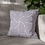 Thumbnail: Square throw pillow with purple and white geometric curved line patterns, perfect for modern and elegant home decor.