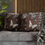 Thumbnail: Decorative pillowcase with brown background featuring cream and black butterflies, moths, and beetles on one side, and grey a