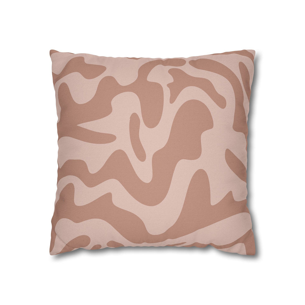 Pillow cover with a blush and dusty rose abstract camo pattern, offering a soft, modern twist on a classic design.