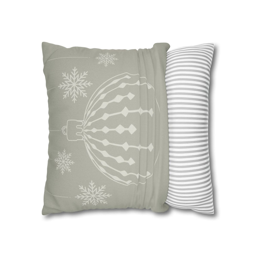 Decorative pillow cover with a minimalist design of a Christmas ornament and snowflakes on a soft neutral background.