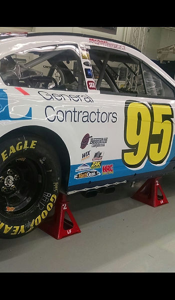 "Lightweight carbon fiber components enhance speed and durability in NASCAR machines."