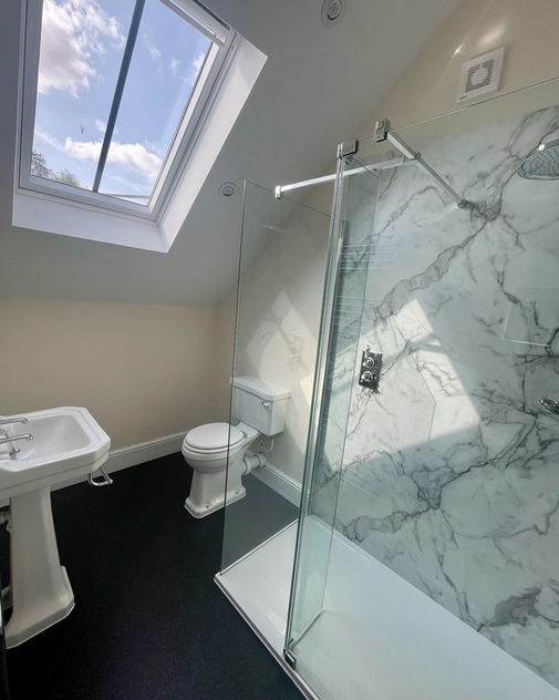 Upstairs bathroom with skylight.