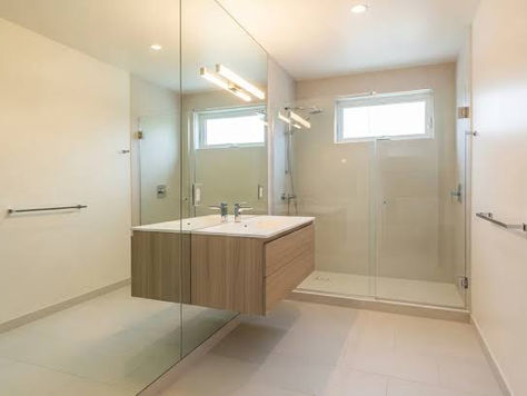 Darker Glass Makes A Bathroom Feel Larger