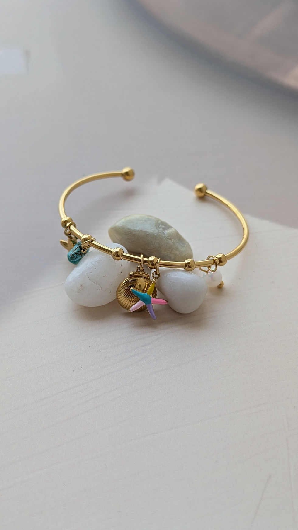 Thumbnail: Gold Bracelet with Starfish and Shell Charms