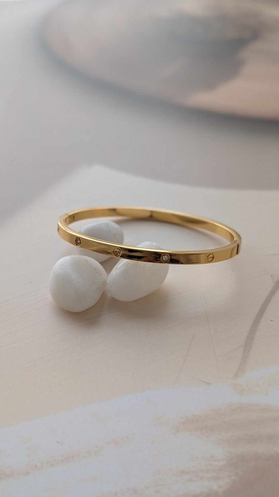 Thumbnail: Gold Bangle with Stone Details