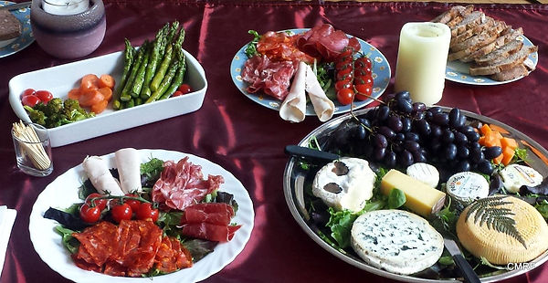 charcuterie meat chease candle bread asparagus