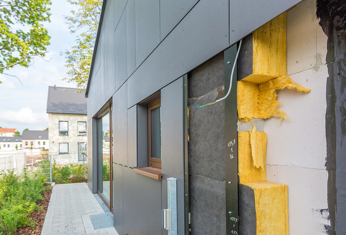 isolation-murs-exterieur-panneaux-laine-maison.webp