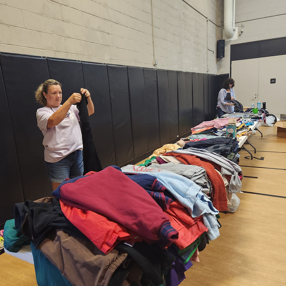 Volunteer at FBC Sorting Clothes