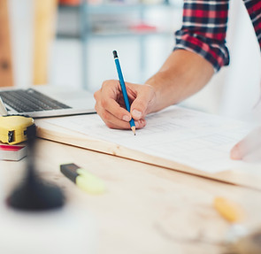Person Writing Plans