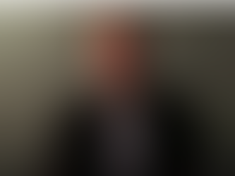 Dr Daniel Siegel presenting a Hand Model of the Brain