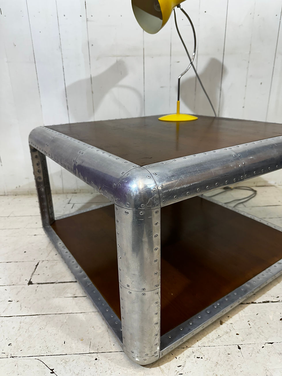 Thumbnail: Aviator table, retro coffee table, riveted aluminium coffee table, interior design, hotel coffee tables, industrial look,