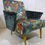 Thumbnail: 1960's lounge chairs, floral print fabrics, textured green velvet arms, limited edition chairs only from The Rare Chair Co