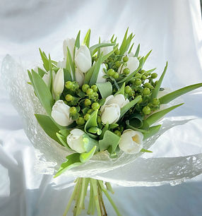 white tulip and hypericum bouquet