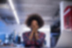 A stressful woman with her hands on her face