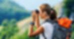 adventurous Enneagram 7w6 woman looking in her binoculars