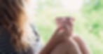 Safety seeking Enneagram 7w6 woman holding a coffee cup