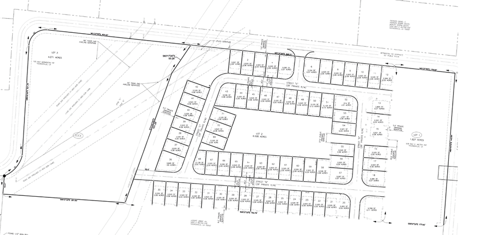 Commercial pad site parcels with a build-to-rent community at the rear with additional office building space