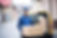 Delivery man delivering parcel box to recipient stock photo containing.jpeg