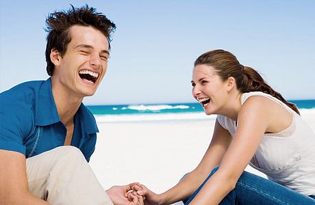 Couple Laughing at the Beach