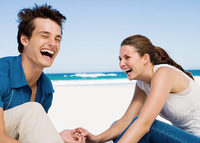 Couple Laughing at the Beach