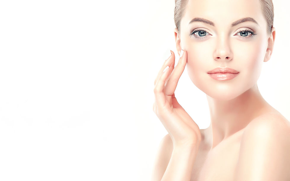 Beautiful Young Woman with Clean Fresh Skin touch own face . Facial treatment . Cosmet
