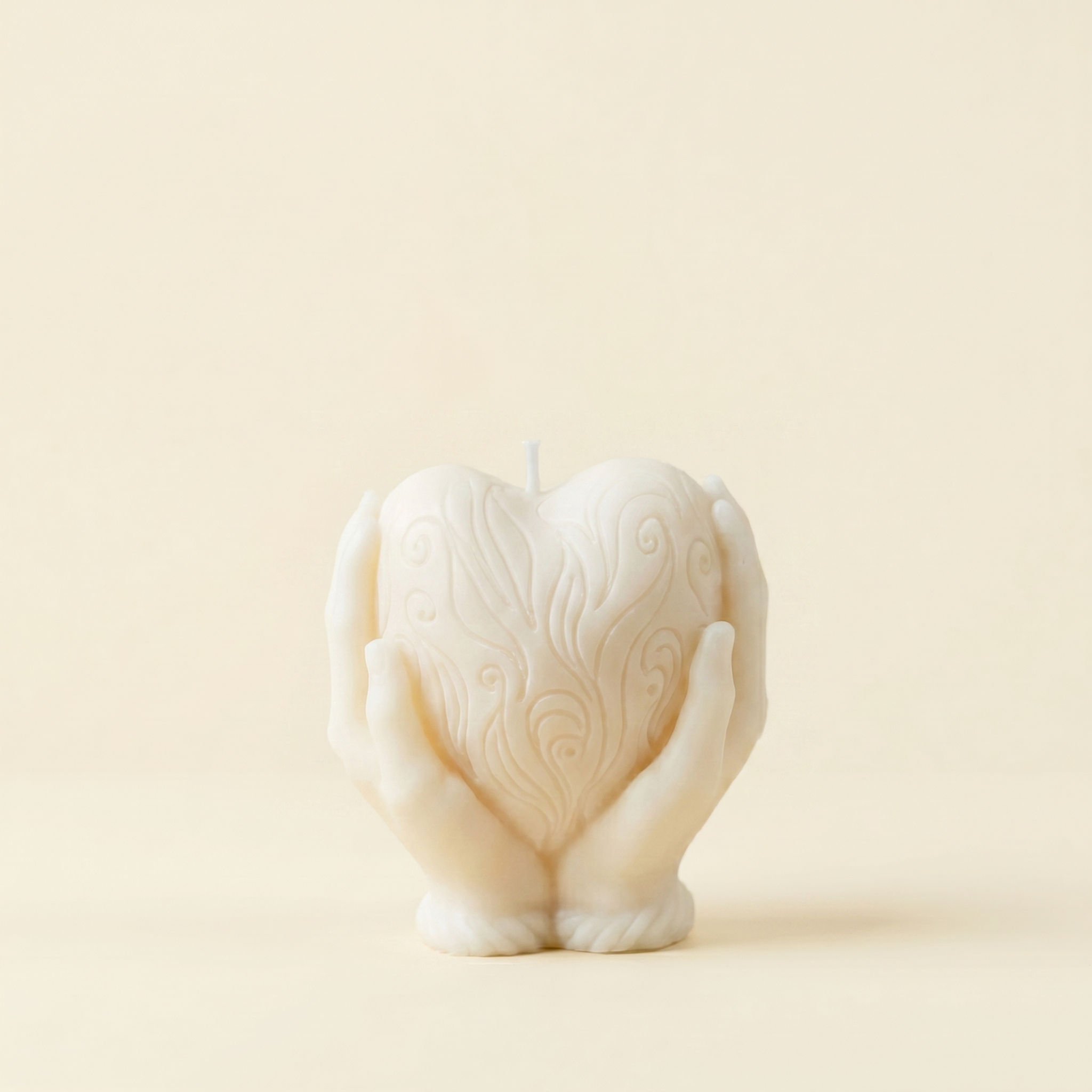 Figura Corazón en mano