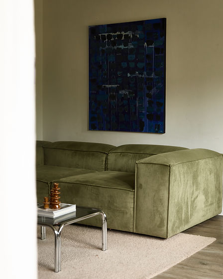 Modern Living room green sofa and blue abstract paintin
